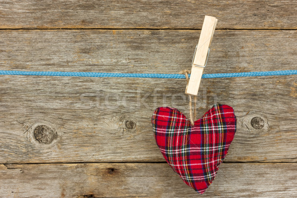 Heart hang  over a wooden background Stock photo © Grazvydas