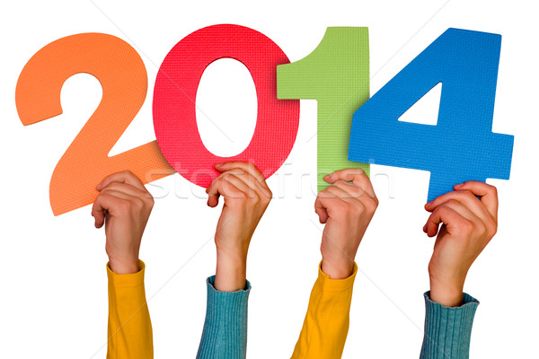 Hands with numbers shows year 2014 Stock photo © Grazvydas
