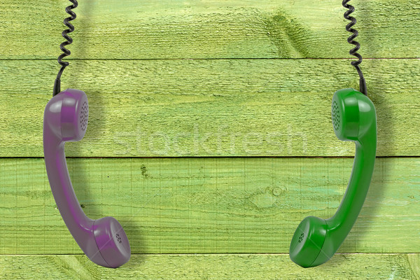 handsets hung against wooden wall Stock photo © Grazvydas