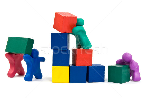  plasticine people building wooden blocks Stock photo © Grazvydas