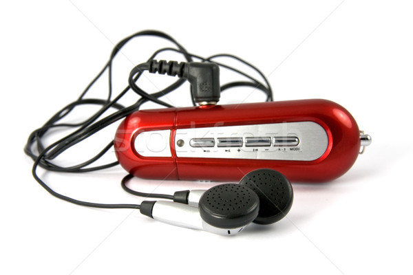 Rood draagbaar muziekspeler witte hoofdtelefoon digitale Stockfoto © Grazvydas