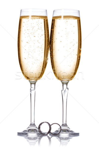 Champagne and wedding rings Stock photo © Grazvydas