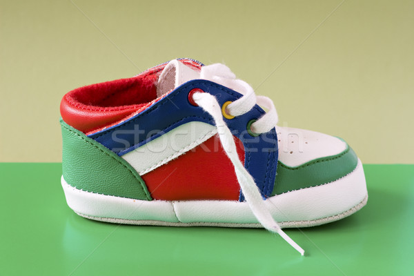 baby shoeon green background Stock photo © Grazvydas
