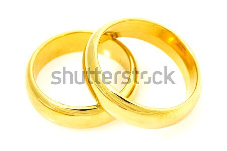 Pár arany jegygyűrűk fehér szeretet pár Stock fotó © Grazvydas