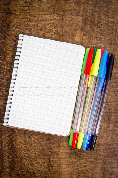 Espiral cuaderno colorido plumas escritorio Foto stock © Grazvydas