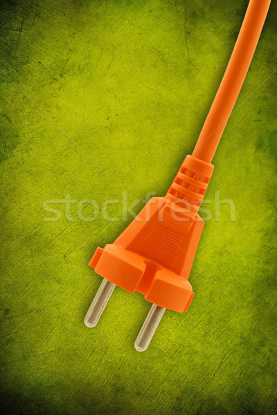 Oranje elektrische plug groene donkere technologie Stockfoto © Grazvydas