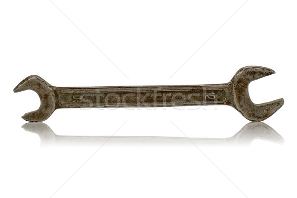 ржавые гаечный ключ черный изолированный белый работу Сток-фото © Grazvydas