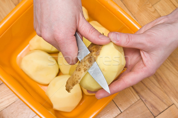 peeling potatoes Stock photo © Grazvydas
