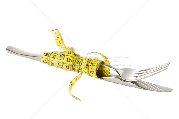 Fork and knife wrapped by measure tape Stock photo © Grazvydas