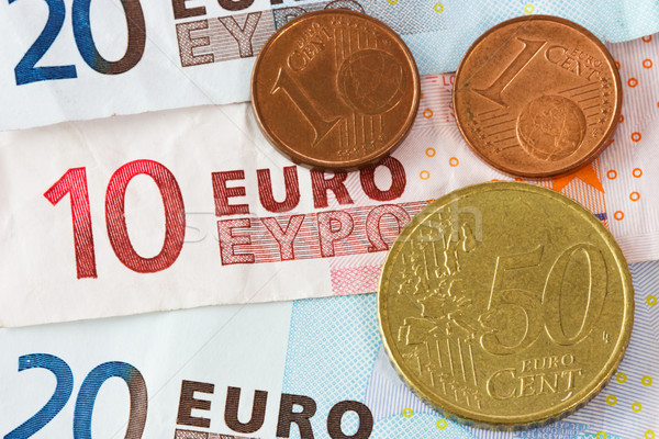 Euro banknotes and coins Stock photo © Grazvydas