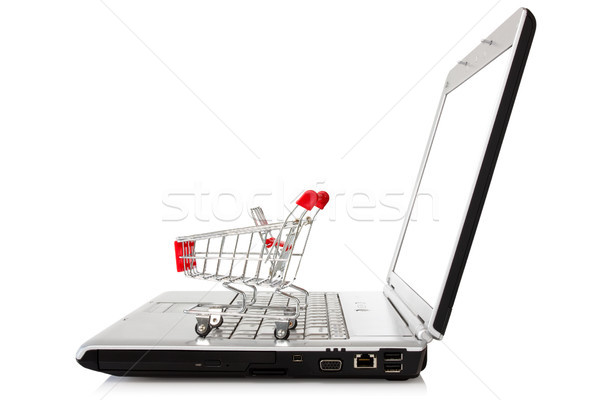 laptop with shopping cart  Stock photo © Grazvydas