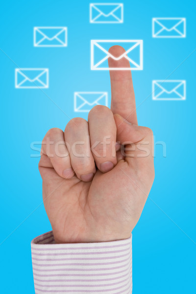 Interactive communication pointant lettre icône affaires Photo stock © Grazvydas