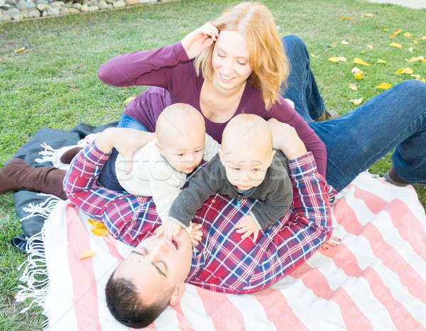 A Mom And Dad With Twin Boys Stock photo © gregorydean