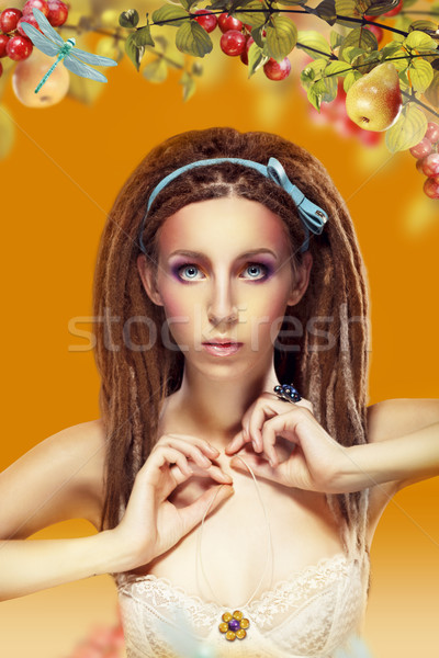 Young Woman with Dreadlocks over Colorful Background Stock photo © gromovataya