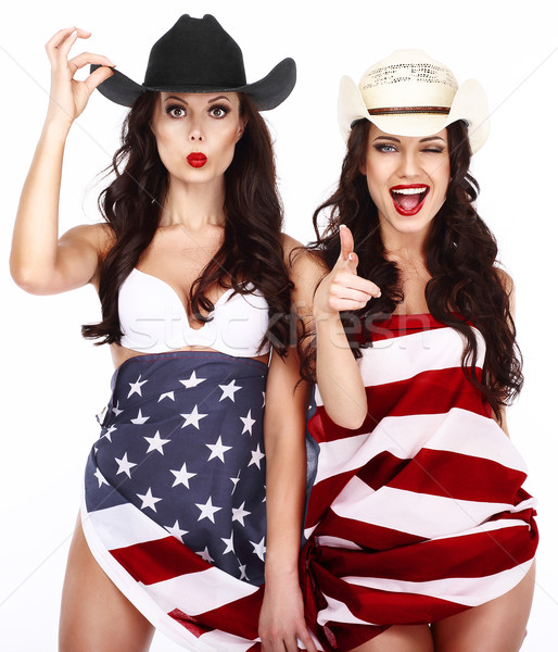 Two Ecstatic Showy Women Wrapped in USA Flag Stock photo © gromovataya