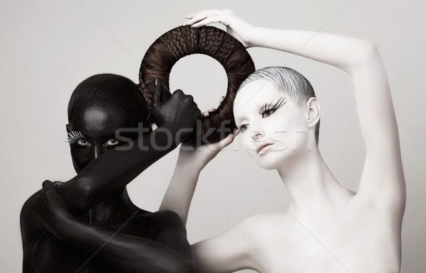 Women in Ying Yang Style. Occult Contrast Make-up. Unity Stock photo © gromovataya