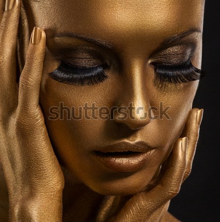 Face Art. Fantastic Gold Make Up. Stylized Colored Woman's Body Stock photo © gromovataya