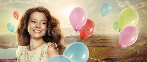 Holiday. Happy Woman with Colorful Air Balloons Stock photo © gromovataya