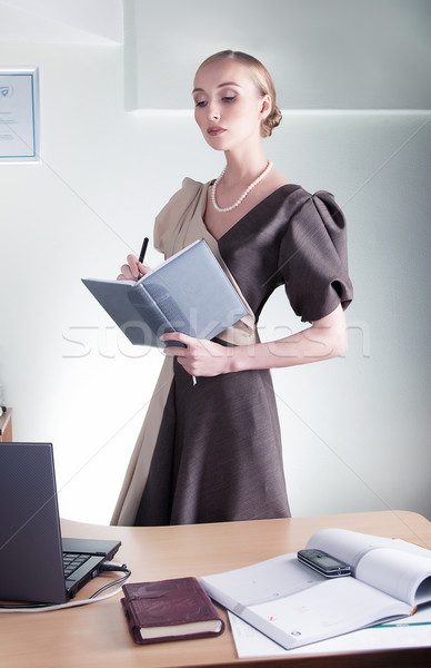 Elegant aristocratic lovely business woman studying Stock photo © gromovataya