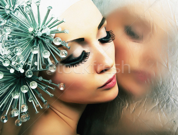 Fashion hairstyle model reflects in mirror - bright makeup Stock photo © gromovataya