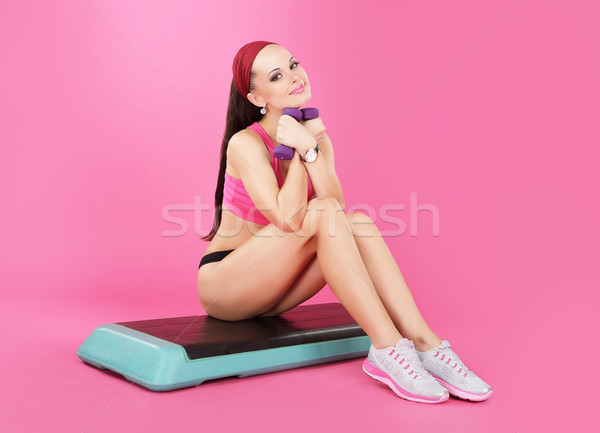 Recreation. Slender Calm Woman with Dumbbells Relaxing Stock photo © gromovataya