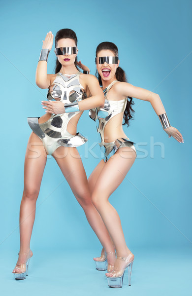 Night Life. Two Glamorous Women Dancers in Fantastic Masks Stock photo © gromovataya