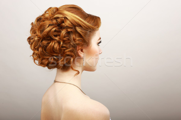 Styling. Rear View of Frizzy Red Hair Woman. Haircare Spa Salon Concept Stock photo © gromovataya