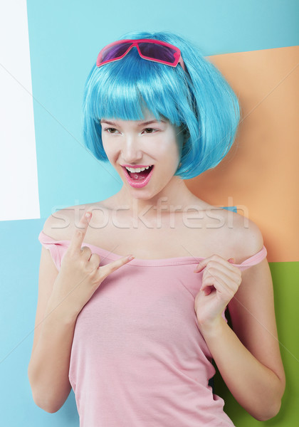Excited Playful Woman with Fancy Blue Hair Indicating Success Symbol Stock photo © gromovataya