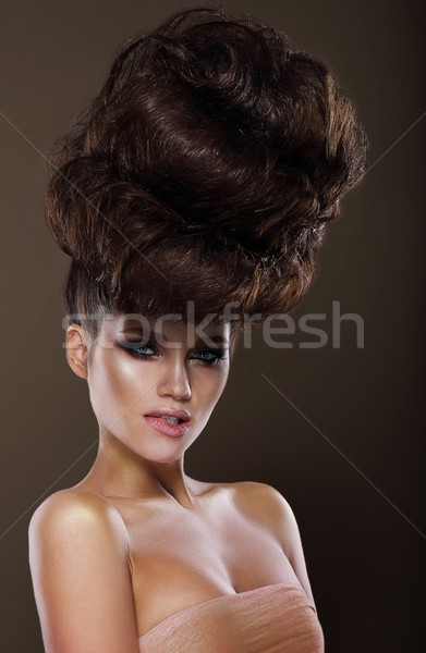 Updo. Trendy Woman with Creative Hairstyle Stock photo © gromovataya