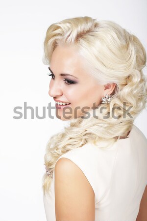 Portrait of Smiling Fashionable Blond Hair Woman with Plait Stock photo © gromovataya