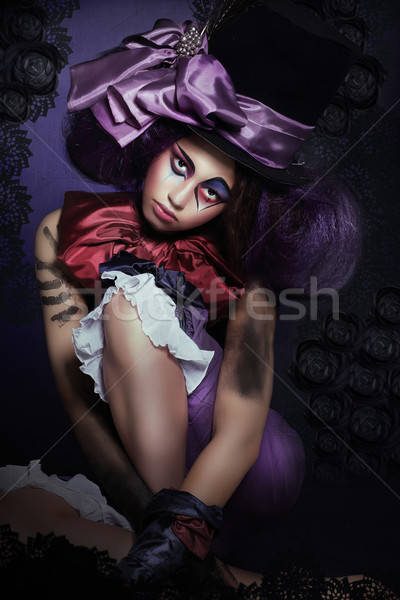 Circus. Jester with Fanciful Makeover in Foolish Hat Stock photo © gromovataya