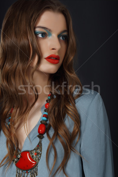 Stock photo: Young Woman with Bright Makeup and Necklace