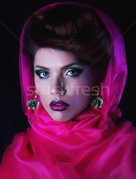Portrait of imposing brunette woman in a crimson mantle close up Stock photo © gromovataya