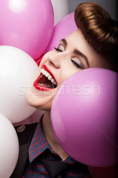 Elation. Happy Laughing Girl with Colorful Air Balloons - Sales Stock photo © gromovataya