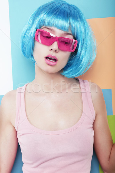 Styling. Portrait of Showy Woman with Blue Hairs over Patchwork Wall Stock photo © gromovataya