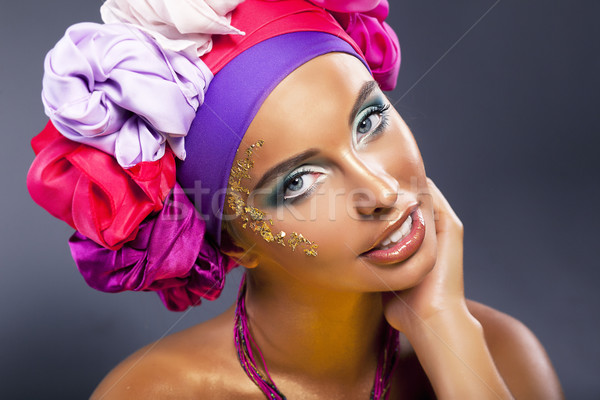 Colorful shawl. Pretty woman face - bright gold make up Stock photo © gromovataya