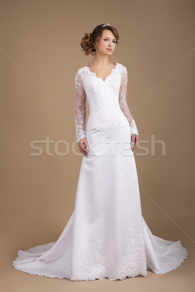 Graceful Exquisite Auburn Bride in Wedding Dress Stock photo © gromovataya