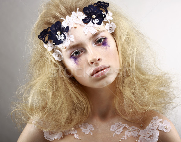Young Styled Blonde with Colorful Makeup - Blue Eye Shadows. Arts Stock photo © gromovataya