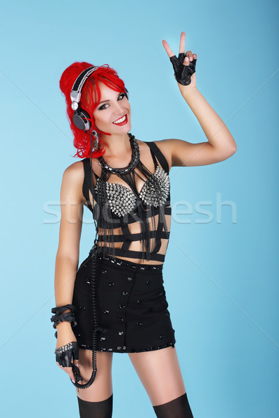 Expression. Glamorous Trendy Woman with red Hairs showing Victory Sign Stock photo © gromovataya