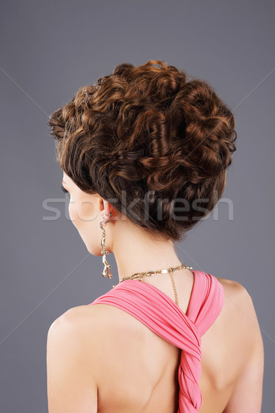 Frizzy Hair. Rear View of Brown Hair Woman with Festive Hairstyle Stock photo © gromovataya