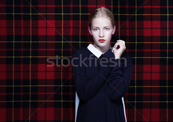 Trendy Young Woman over Abstract Fabric Background Stock photo © gromovataya
