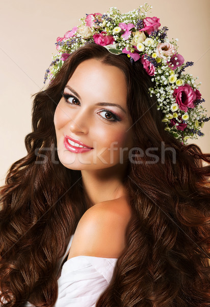 Genuine Young Woman with Flowing Healthy Hairs and Wreath of Flowers Stock photo © gromovataya
