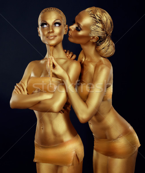 Bodypaint. Two Women Painted Gold. Carnival Stock photo © gromovataya