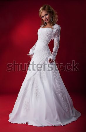 Beautiful fiancee blonde in white nuptial dress posing Stock photo © gromovataya