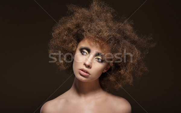 Stylization. Young Brunette with Curly Brown Hairs Stock photo © gromovataya