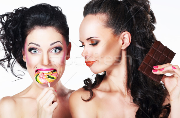 Glam. Couple of Funny Women holding Sweets. Positive Emotions. Vitality Stock photo © gromovataya
