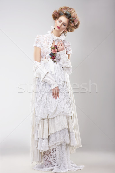 Gorgeous Outre Female in Lacy White Dress with Flowers Stock photo © gromovataya