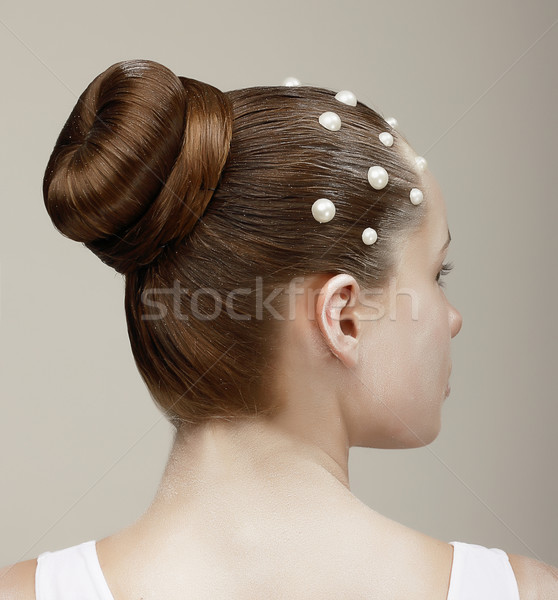 Styling. Woman's Head - Modish Festive Coiffure with Pearls Stock photo © gromovataya
