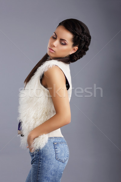 Femme sans manches veste jeans fond Photo stock © gromovataya