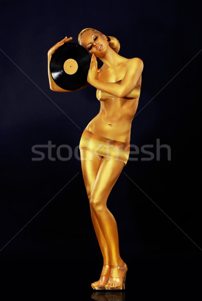 Woman Painted Gold With Vinyl Record Stock photo © gromovataya
